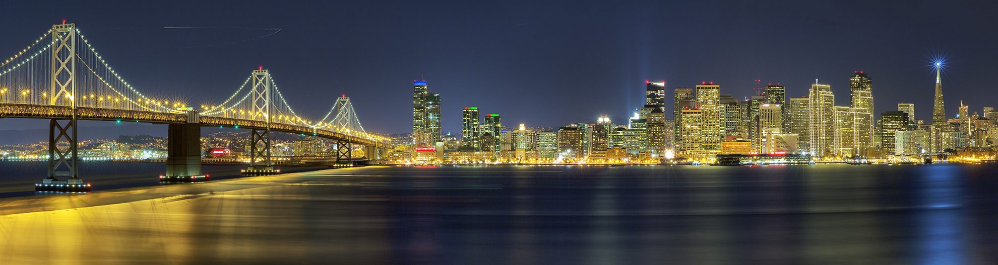 Golden Gate Bridge and San Francisco skyline at night